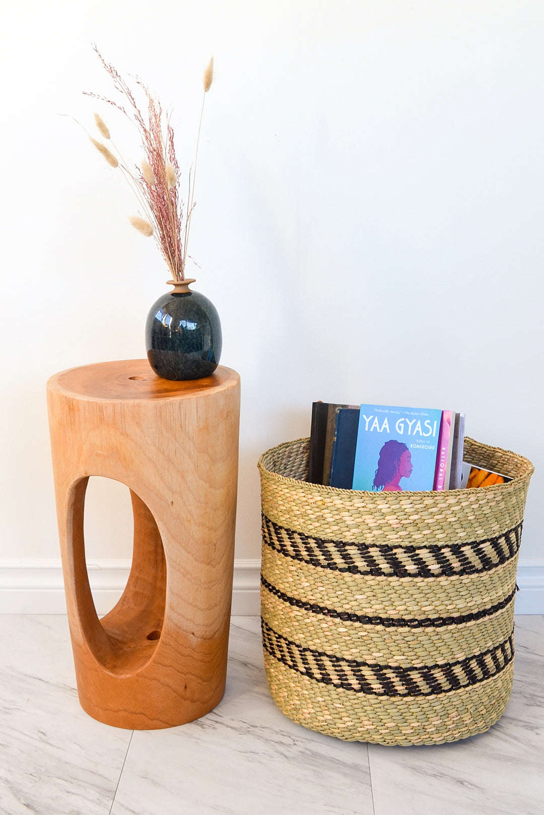 Hand carved cedrela wood side table from Ghana