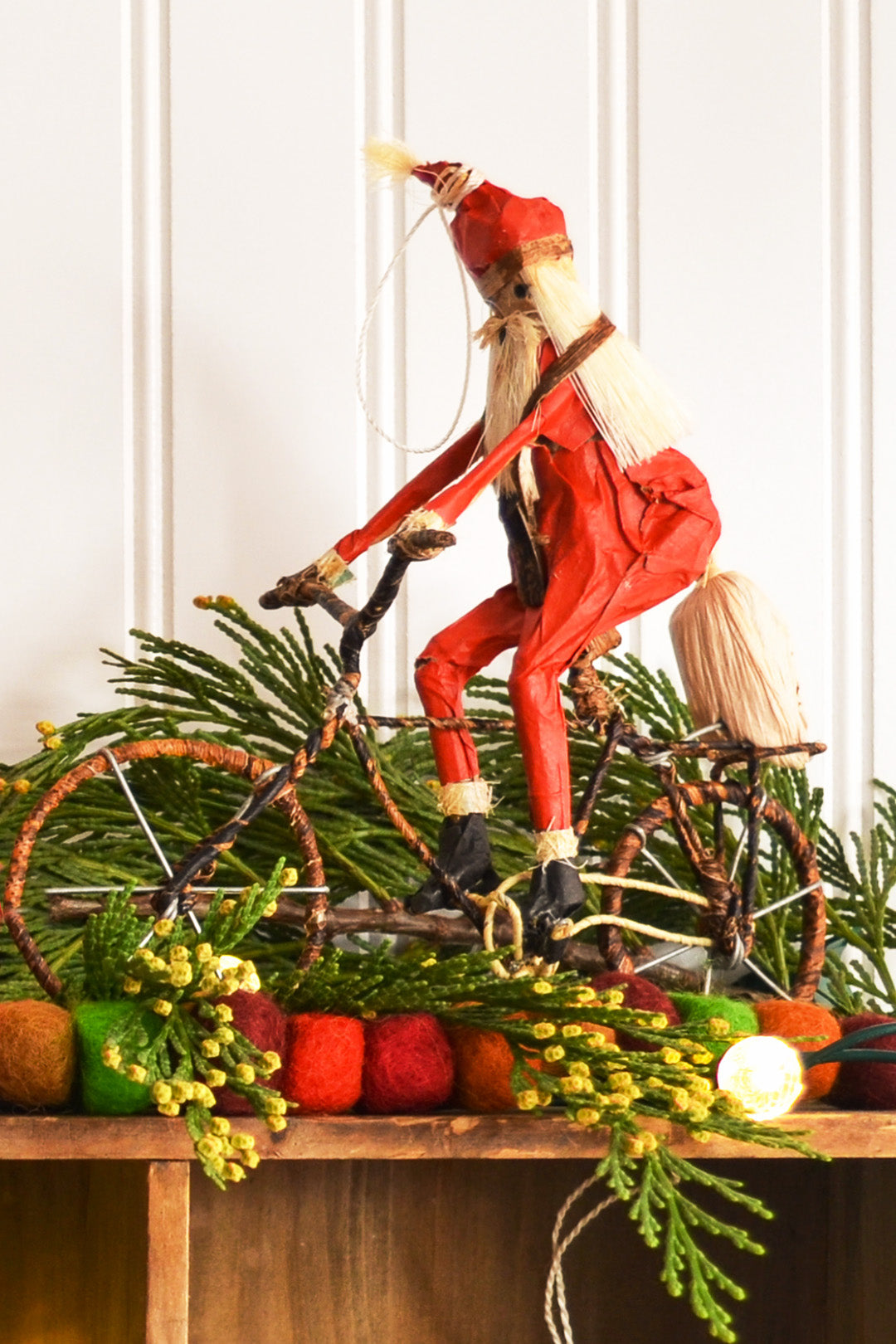 Santa on a Bicycle Large Banana Fiber Ornament